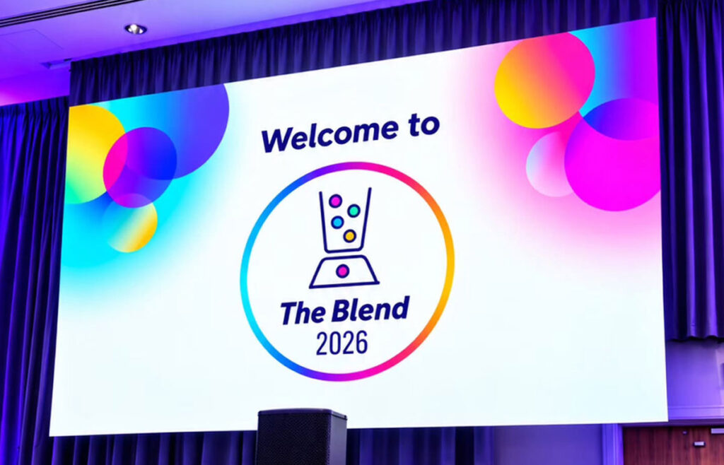 Welcome to The Blend 2026 screen above the stage